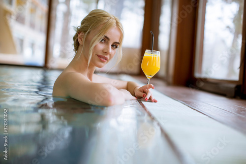 Pretty young blonde woman r...
