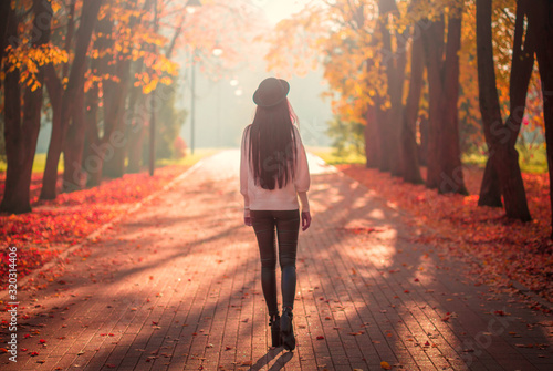  Woman in white jumper, black hat, autumn nature, happy