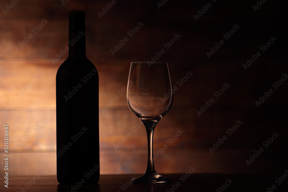 red wine with empty goblet red wine with empty goblet
