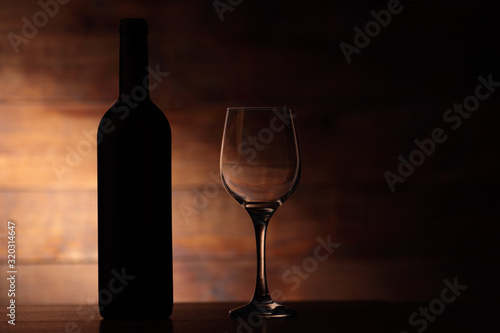 red wine with empty goblet