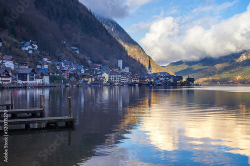 Hallstatt  a charming village on the Hallstattersee lake and a famous tourist attraction  with beautiful mountains surrounding it  in Salzkammergut region  Austria  in winter sunny day.