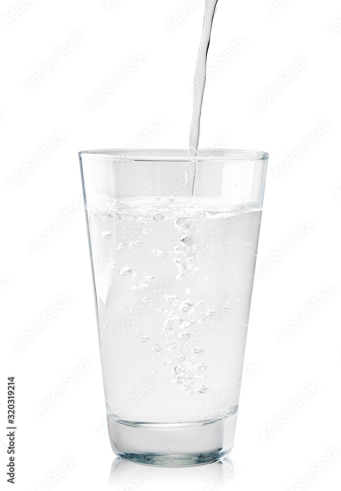 Glass Cup is filled water in close-up on a white background. Isolated Glass Cup is filled water in close-up on a white background. Isolated