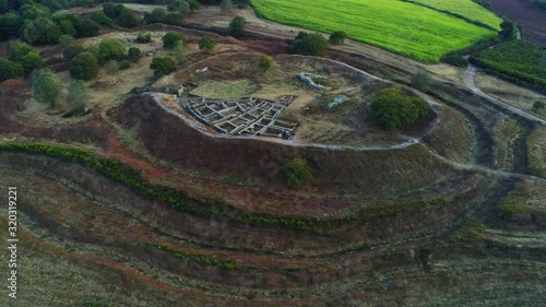 Aerial flying over Castro de Castromaior, Spain, orbit movement photo