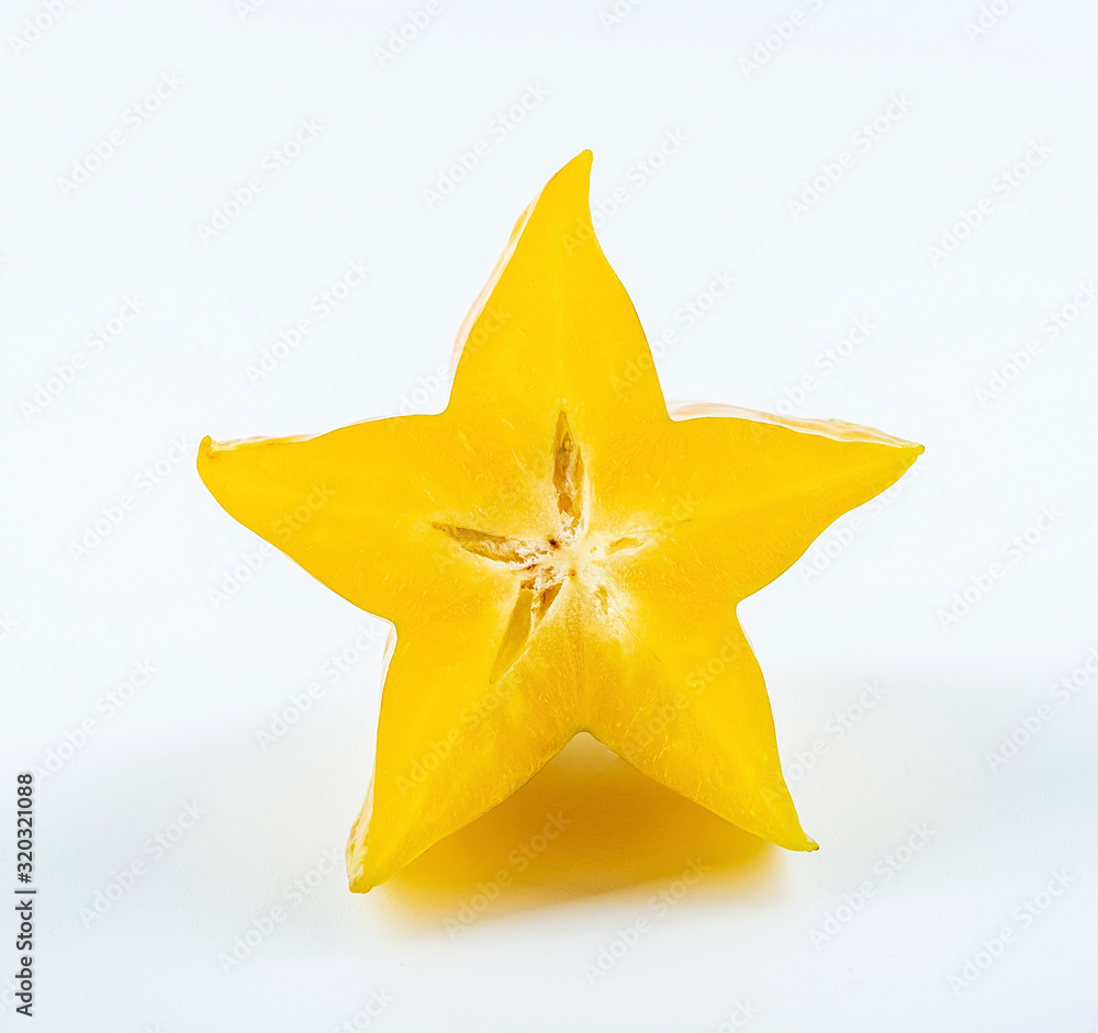 Fresh fruits carambola and pulp slices on white background Fresh fruits carambola and pulp slices on white background