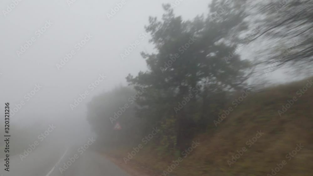 Hyperlapse driving on a foggy mountain road