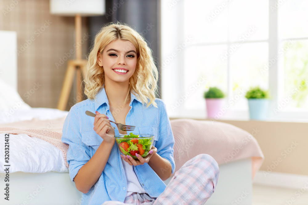 concept of healthy eating. happy woman eating vegetable vegetarian salad. concept of healthy eating. happy woman eating vegetable vegetarian salad.