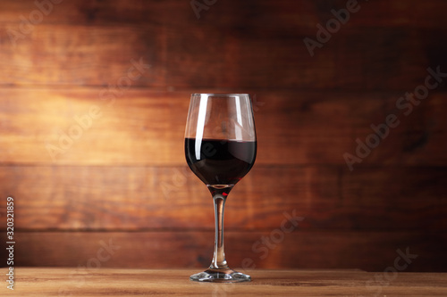 goblet with wine on the counter