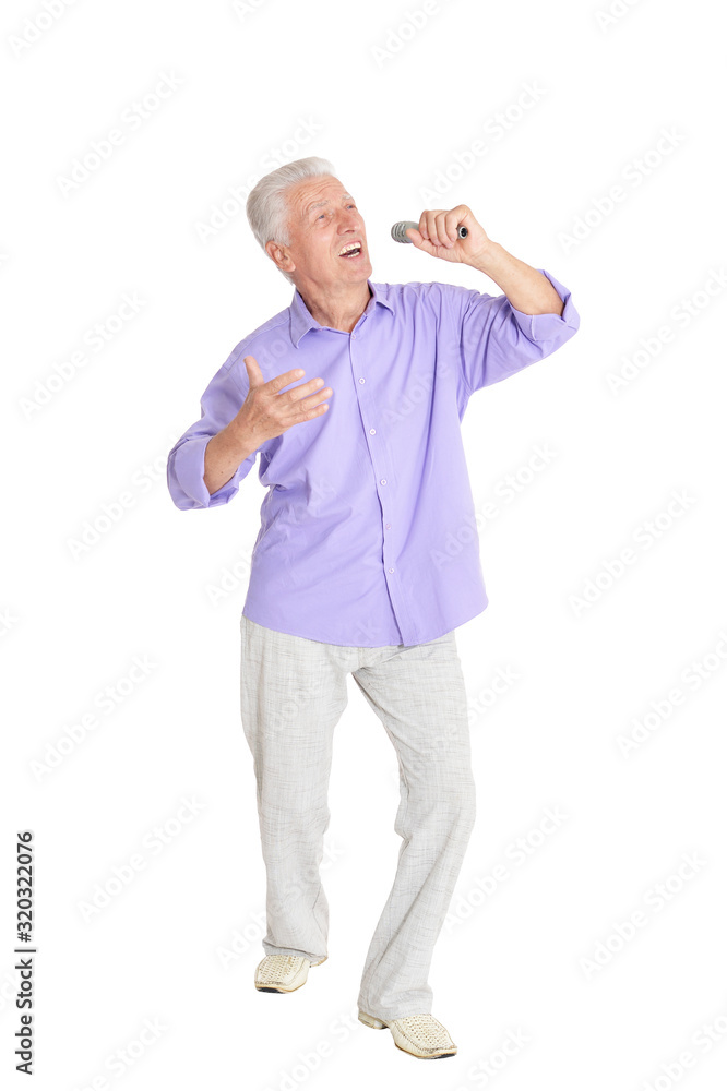 Senior man singing karaoke isolated on white background Senior man singing karaoke isolated on white background