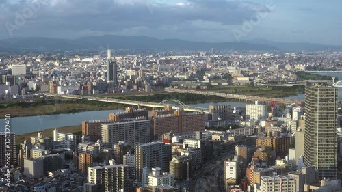 Bird eye view of skyscrapers in the Kita downtown with Yodo River on the background. Osaka. Japan photo