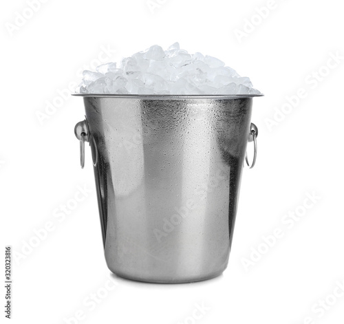 Metal bucket with ice cubes isolated on white