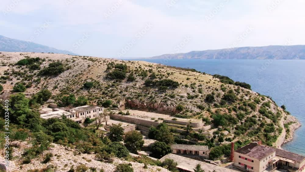 Drone panning in old communist prison on a Goli otok Drone panning in old communist prison on a Goli otok