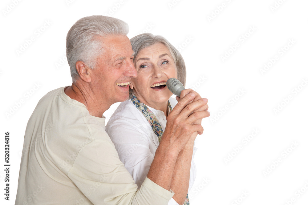 Portrait of a senior couple with microphone Portrait of a senior couple with microphone