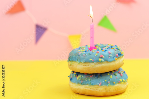 Birthday donuts with candle.