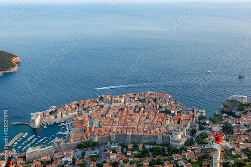 The City of Dubrovnik, Croatia, at sunset as seen from above from the viewpoint of Srd Hill. The UNESCO World Heritage Site and the famous walled city is surrounded by the Adriatic sea.