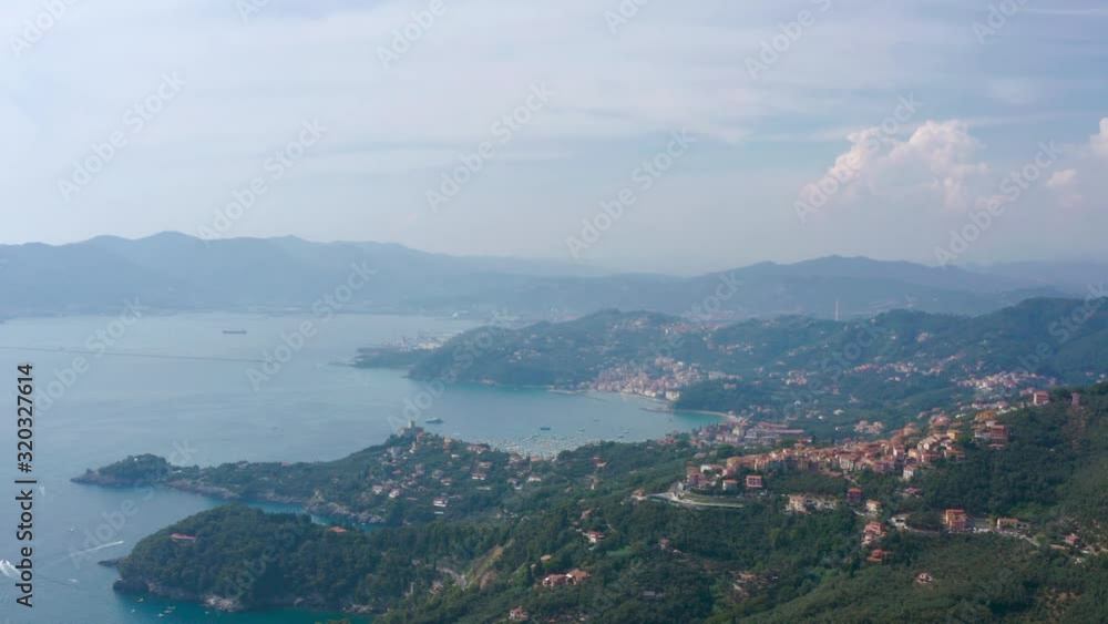 Pull back aerial shot revealing vibrant, colorful LaSpezia gulf and the Italian coastline Pull back aerial shot revealing vibrant, colorful LaSpezia gulf and the Italian coastline