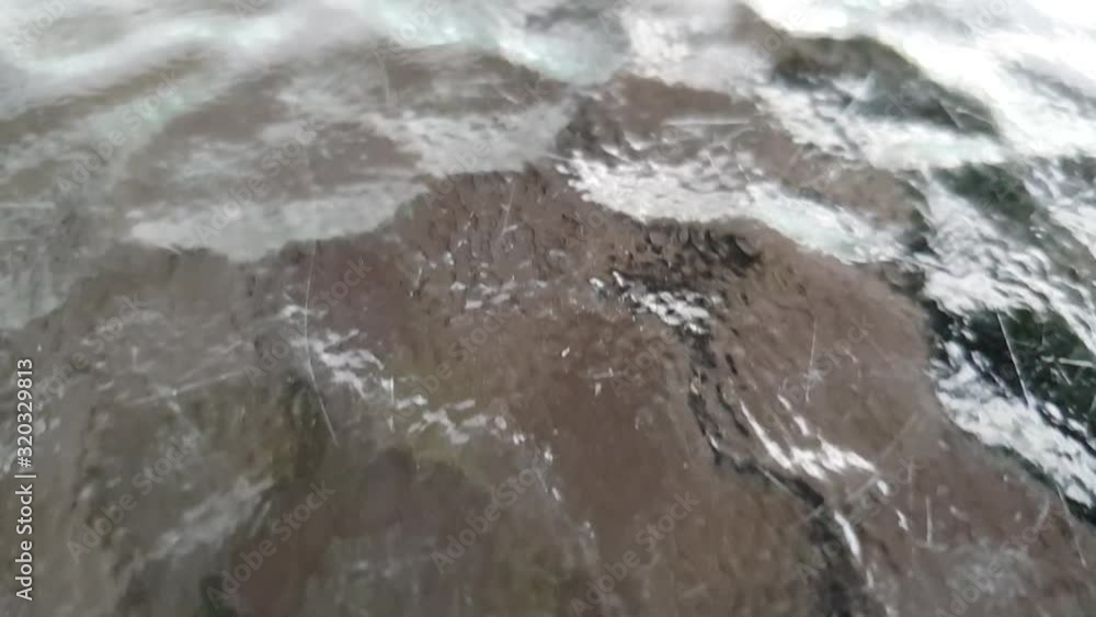 Glass table top with fine scratches and bumpy textured pattern surface slow motion moving footage Glass table top with fine scratches and bumpy textured pattern surface slow motion moving footage