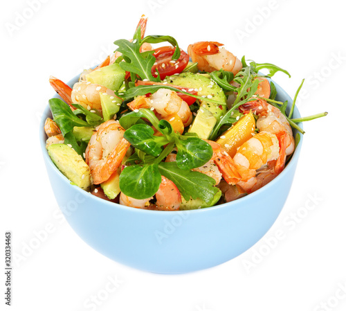 Salad with avocado, shrimp, fresh cherry tomatoes and arugula