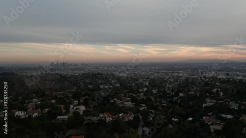 Wide aerial shot of Los Angeles basin at twilight hour. 4K