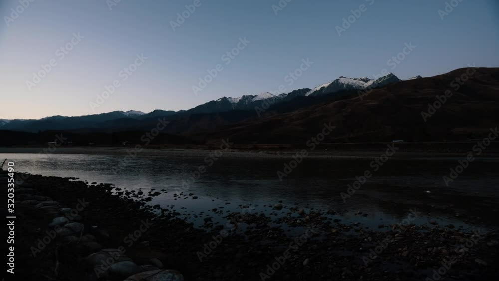 Time lapse of river flows and the dark is falling down Time lapse of river flows and the dark is falling down