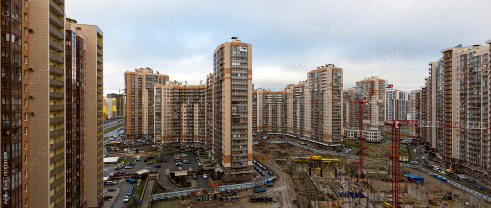 Obraz premium Multi-storey buildings of a residential complex in the Primorsky district of St. Petersburg