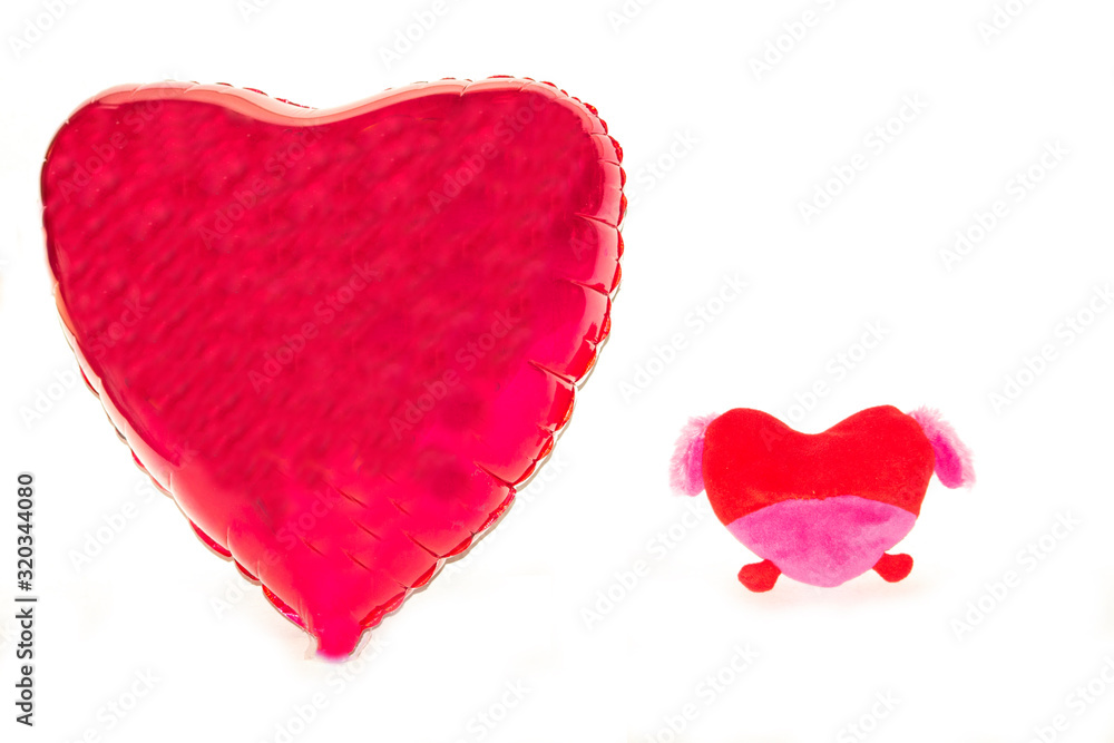 Two red hearts on a white background. Big and small heart