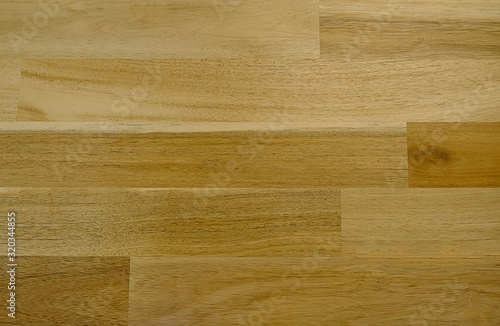 The wooden structure of the laminate. The texture of the parquet. Wood parquet texture, wooden floor background