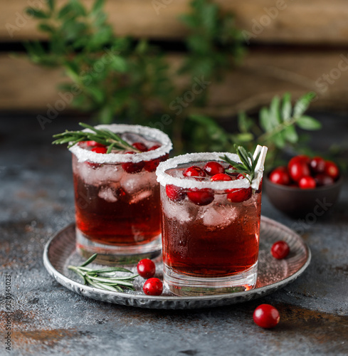 Wallpaper Mural Cranberry cocktail with ice. Christmas cranberry beverage in glasses decorated with sugar and rosemary Torontodigital.ca