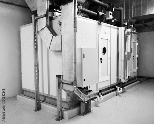 Schilderij op canvas Air Handling Unit,AHU/An air handler, or air handling unit, is a device used to regulate and circulate air as part of a heating, ventilating, and air-conditioning system