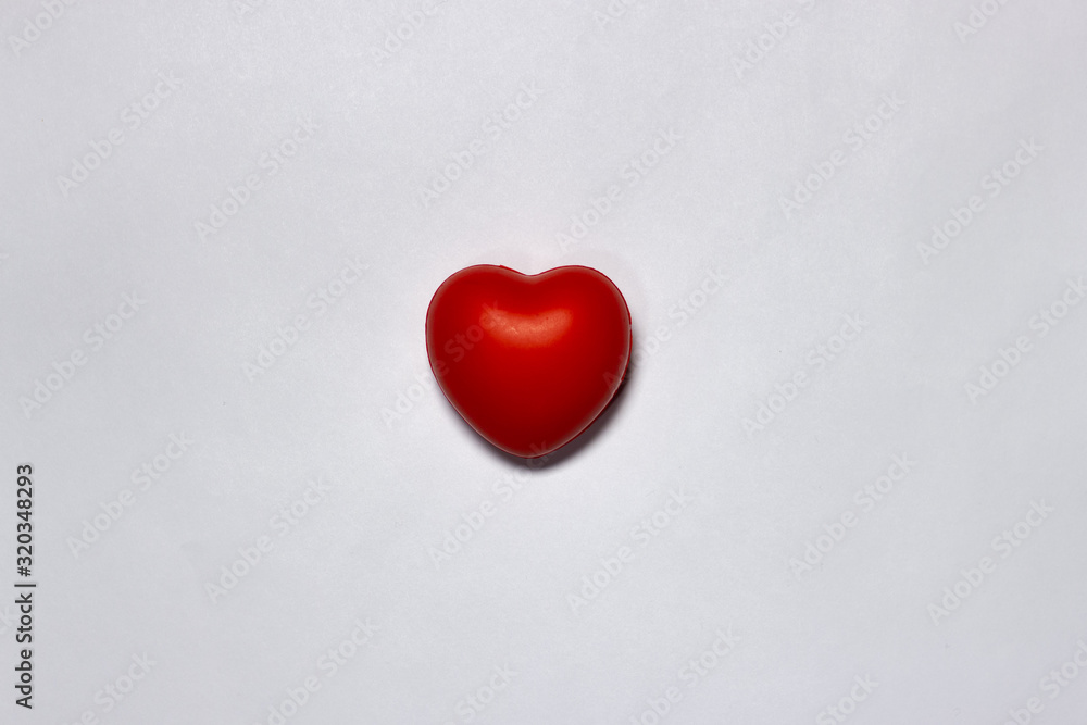 Red heart of love on an isolated white background
