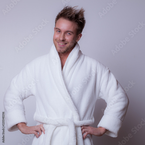 Handsome young elegant man studio portrait.