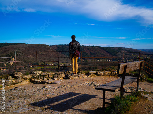 A Solo Traveler Looking Out Over The Hill Country Of Southern France