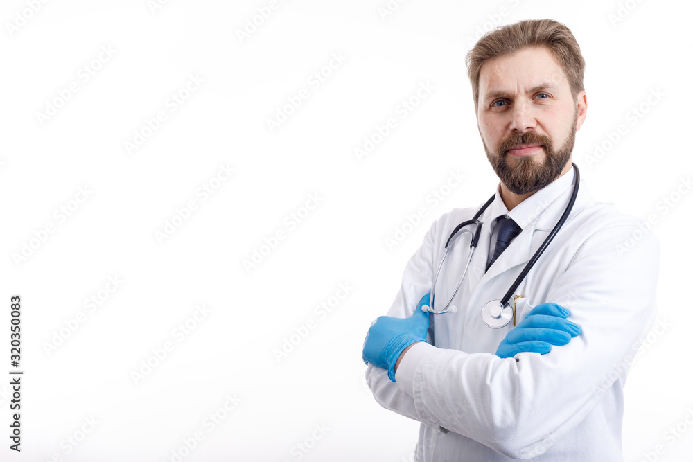 Cheerful doctor in white scrubs and medical gloves posing, arms crossed isolated white background copyspace Cheerful doctor in white scrubs and medical gloves posing, arms crossed isolated white background copyspace