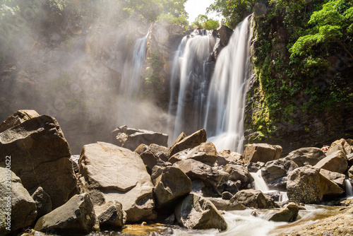 Top part of Nauyaca Waterfalls in Costa rica, a majestic cascading fall in Dominical province, Costa Rica photo