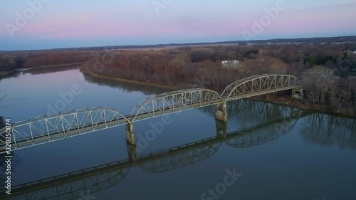 Aerial view of New Harmony bridge connecting White County, Illinois and the city of New Harmony, Indiana. Shot with Phantom Four Pro. Filmed December, 2019. photo