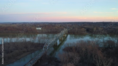 Aerial view of New Harmony bridge connecting White County, Illinois and the city of New Harmony, Indiana. Shot with Phantom Four Pro. Filmed December, 2019. photo