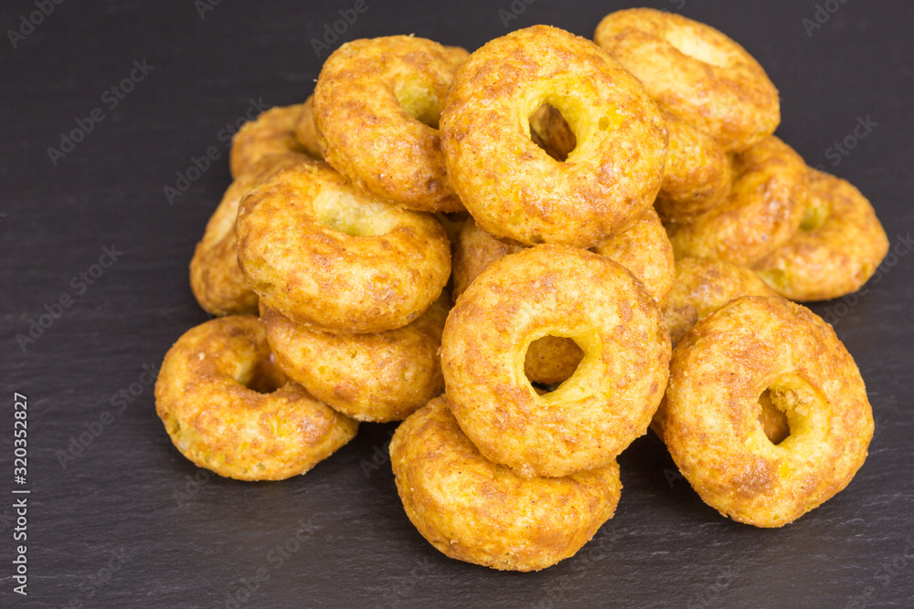 sweet and salty snack - corn puff donuts with peanuts and caramel sweet and salty snack - corn puff donuts with peanuts and caramel