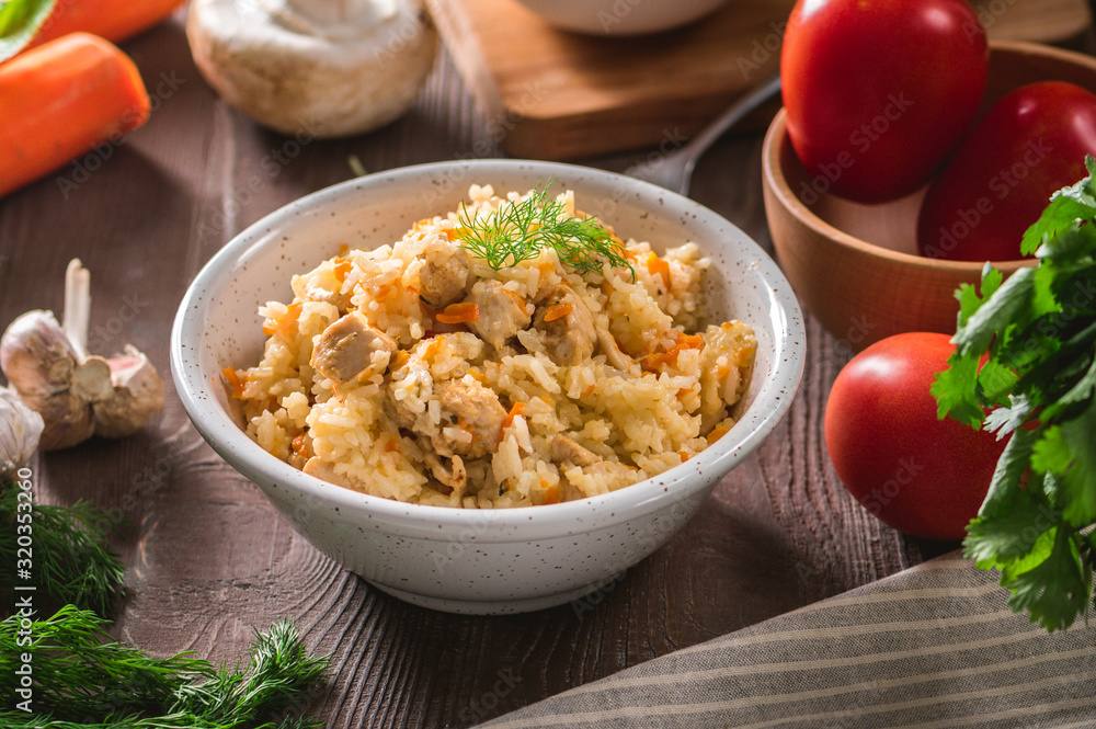 Rice pilaf with chicken meat and vegetables