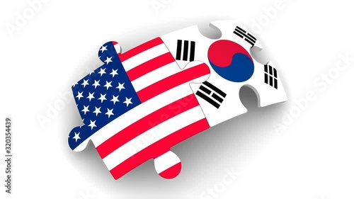 Cooperation between the USA and South Korea. Puzzles with flags of the United States of America and South Korea comes together. The concept of coincidence of interests in geopolitics. Footage video