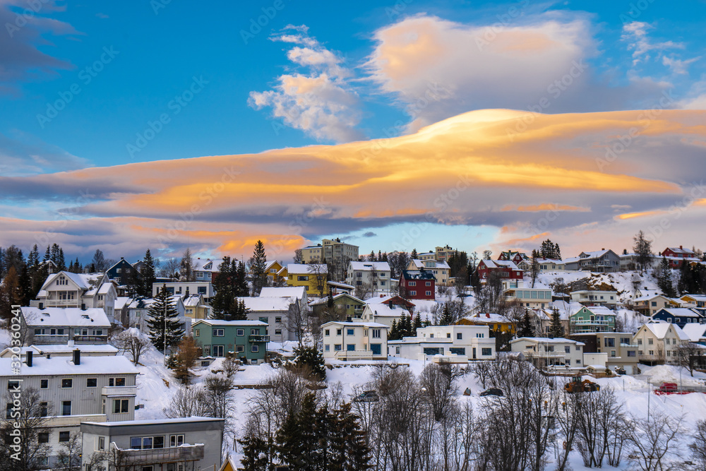 Obraz premium city of Tromso . The first rays of the sun after the polar night