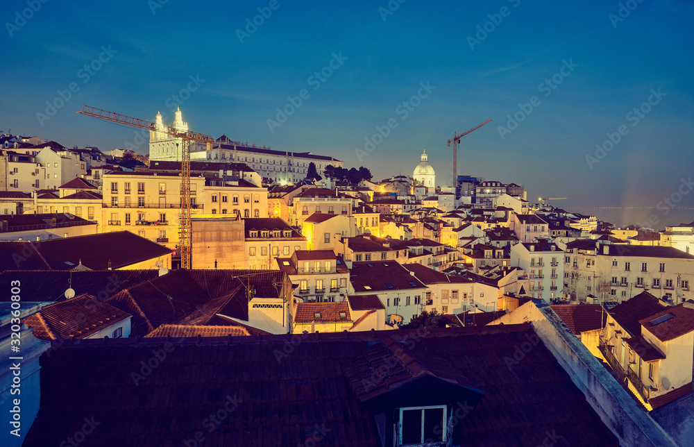 Night cityscape in the old city. Lisbon, Portugal.