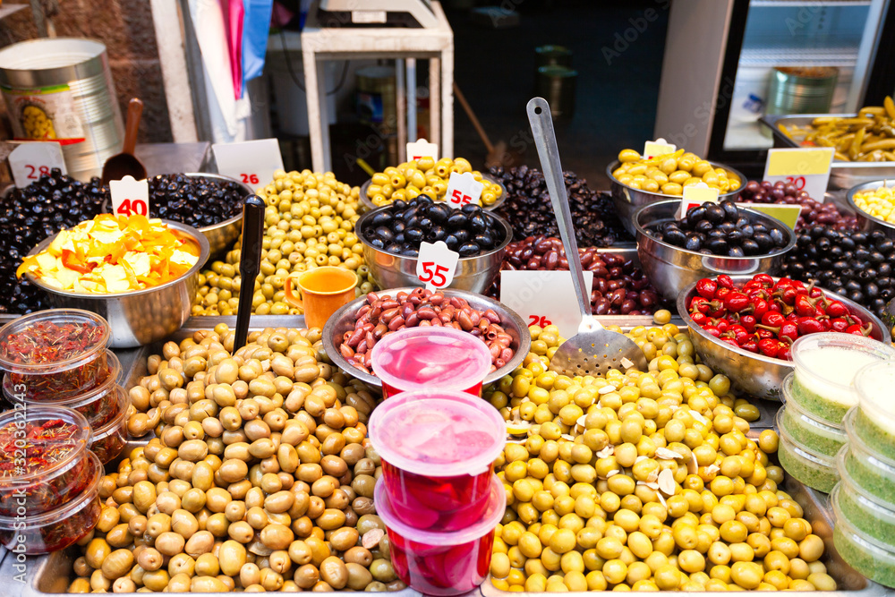 Counter with different types of olives