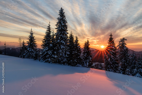 Wonderful sunset with snow and beautiful clouds