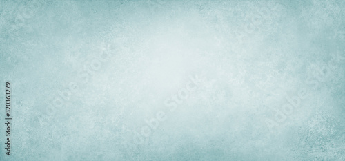 Photographie Old light blue paper background illustration with soft blurred texture on border