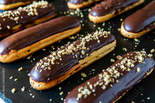 Fotomurale Traditional french eclairs with chocolate