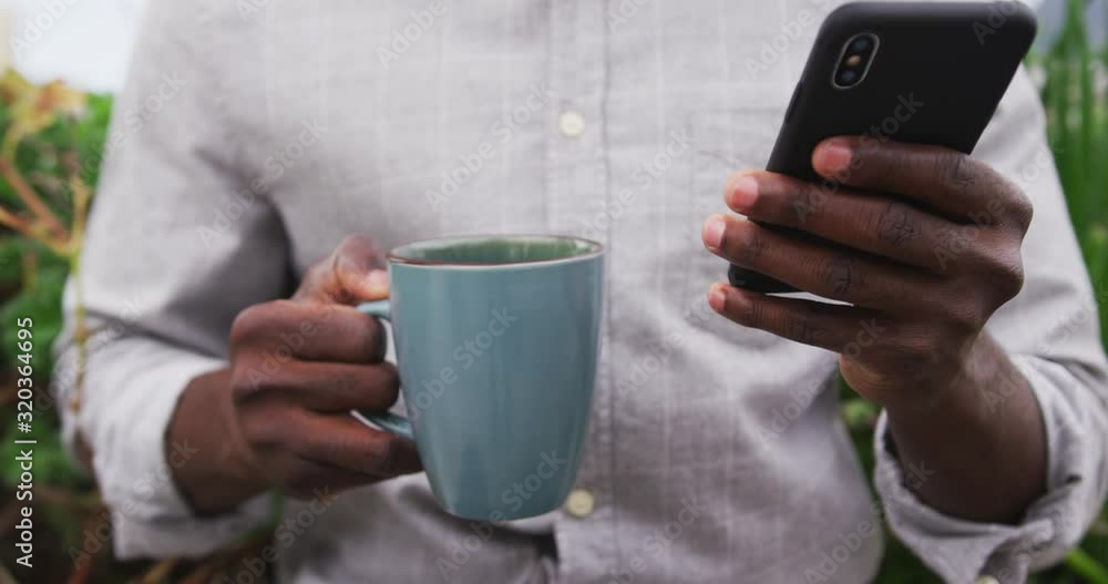 Close up view of woman with coffee and using smartphone Close up view of woman with coffee and using smartphone