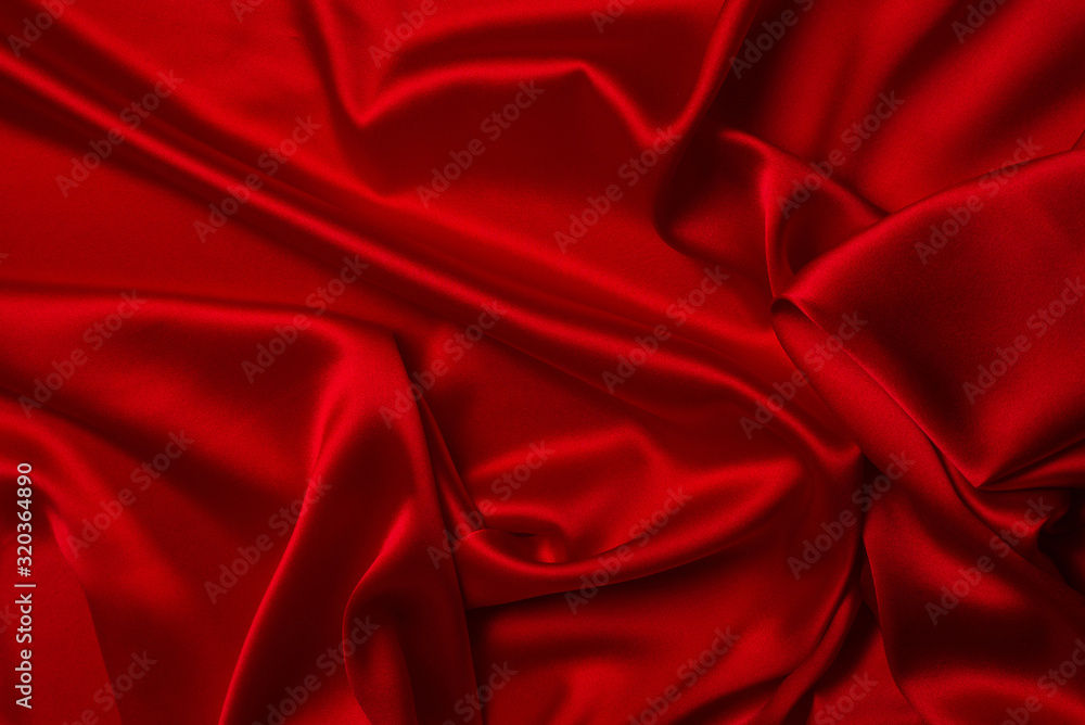 Red silk or satin luxury fabric texture can use as abstract background. Red silk or satin luxury fabric texture can use as abstract background.