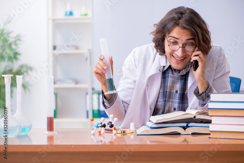 Chemistry lecturer during lecture in college