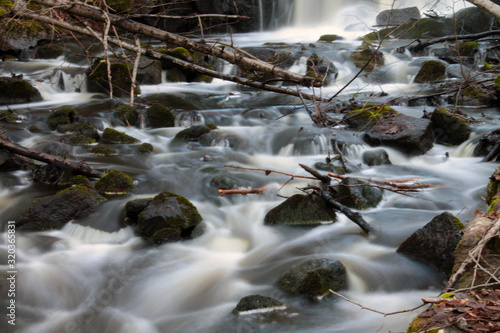 Photographs at a stream in the forest in Sweden