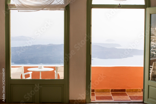 window and blue skyin Santorini photo