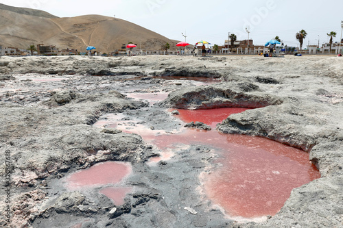 Scene showing the healing mud that has the lagoon called the enchanted in the district of Chilca, has medicinal properties where many visitors come. Lima Peru photo